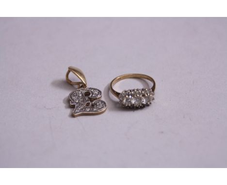 A 9CT DRESS RING, ring size K and a 9ct £1 pendant (2)