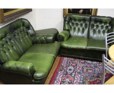 A GREEN LEATHER BUTTONED THREE PIECE SUITE, comprising two x two seater settees and a pouffe (sd)
