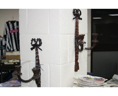 A SET OF FOUR CARVED TWO LIGHT WALL SCONCES, (4)