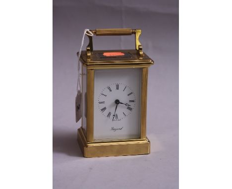 A BRASS CARRIAGE CLOCK, by Bayard, approximate height 11cm