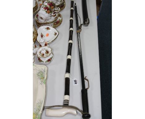 A BONE HANDLED WALKING CANE, with multi-sectional shaft, length approximately 90cm, together with a hunting implement (2)