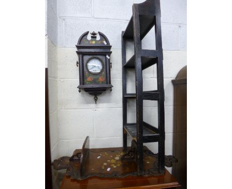 A MODERN DECORATIVE WALL CLOCK, a small ebonised open bookcase and a double wall shelf (3)