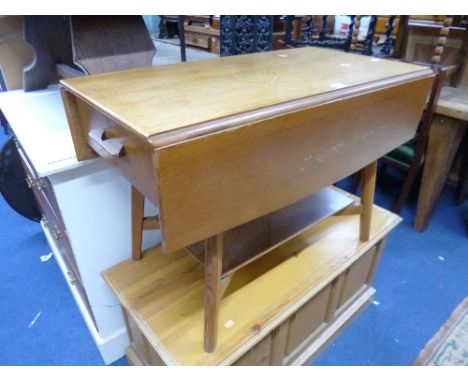 A LIGHT OAK DROP-LEAF TABLE, with two drawers and undershelf (sd)