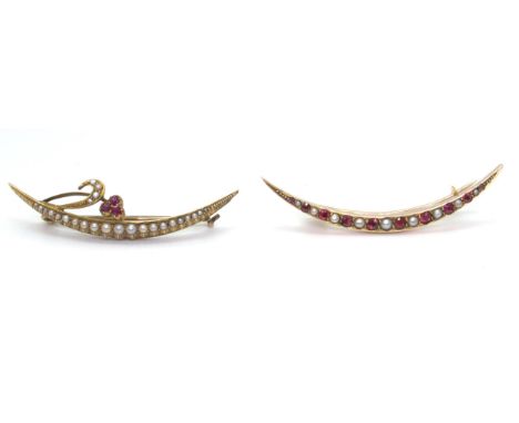 TWO CRESCENT MOON BROOCHES a bright yellow metal pearl and ruby set example, with galleried mount, length 5cm, weight 3.9gms,