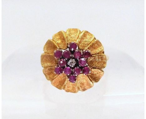 AN ITALIAN RETRO FLOWER CLUSTER RING set with rubies and a diamond, mounted throughout in 18ct yellow gold with Italian hallm