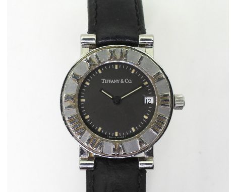 TIFFANY &amp; CO LADIES ATLAS the case in stainless steel with black leather strap with Tiffany buckle. the dial is dark grey
