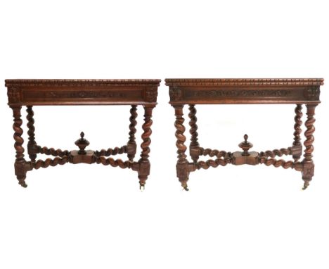 A PAIR OF VICTORIAN OAK FOLD-OVER CARD TABLES&nbsp; each with rectangular moulded edged tops over foliate carved friezes on b