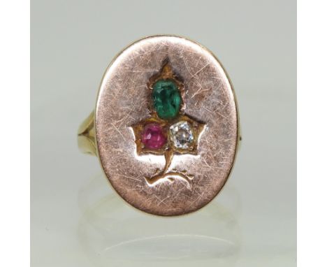 A GLASGOW RING the oval signet ring has a 15ct gold oval that bears hallmarks for Glasgow 1879, and is set with an emerald, r