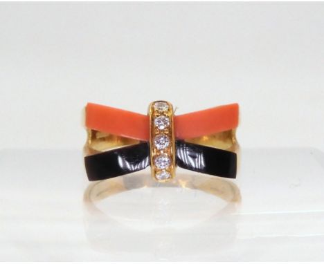 A CORAL ONYX &amp; DIAMOND DRESS RING with London 1975 18ct gold hallmarks, finger size O, weight 5gms Condition Report:Avail