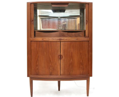A MID 20TH CENTURY DANISH TEAK JOHANNES ANDERSEN BOW TAMBOUR FRONTED CORNER DRINKS CABINET&nbsp;with pair of tambour doors co