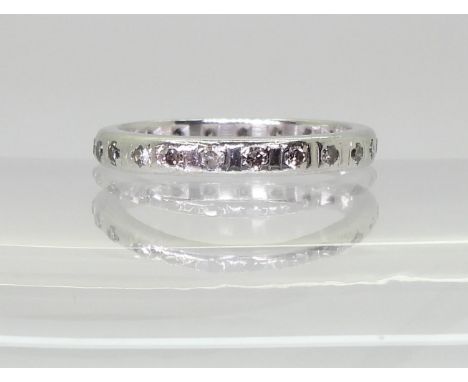 FULL DIAMOND ETERNITY RING starlight brand, un-hallmarked but heavy weight white metal, set with estimated approx 0.30cts of 