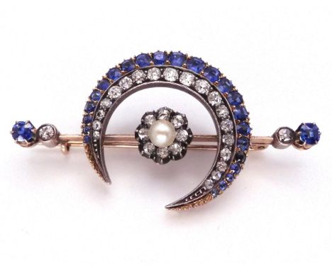 A SUBSTANTIAL CRESCENT MOON BROOCH set with diamonds a pearl and sapphires to the crescent, central flower and to the ends of