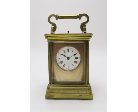 A LATE 19TH CENTURY GILT BRASS AND GLASS REPEATING CARRIAGE CLOCK&nbsp; the white dial with roman numerals and subsidiary min