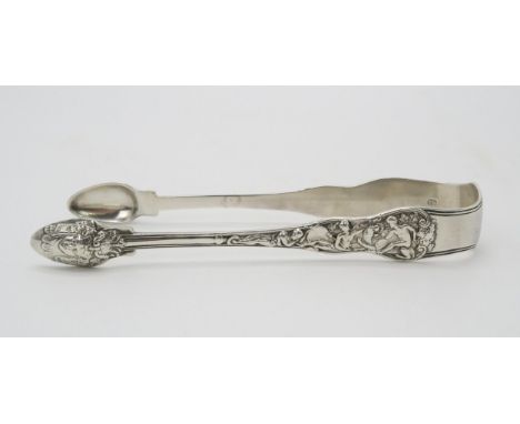 PAUL STORR; A pair of fine Georgian silver sugar tongs, London 1819, in the neoclassical style, cast with a frieze-type scene