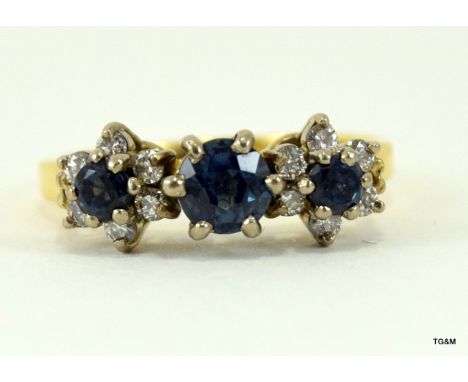 18ct gold ladies diamond and sapphire ring size K