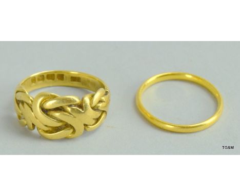 22ct gold wedding band and an 18ct gold gents signet ring