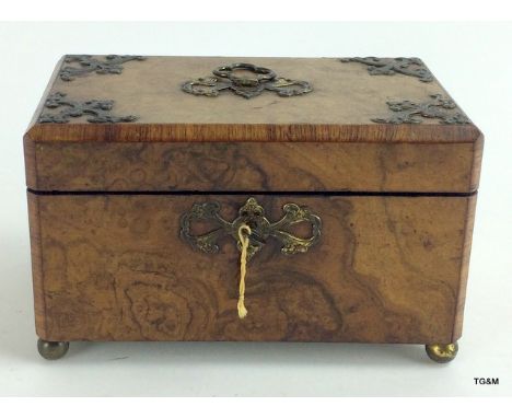 Burr walnut musical tea caddy with inserts and key