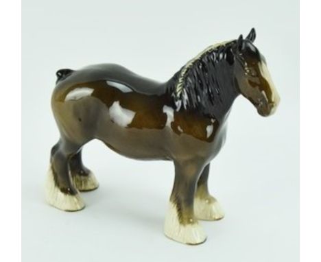 A Beswick model of a Shire Horse standing 22cm high