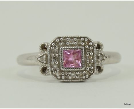 9ct white gold ladies diamond and pink topaz ring size P