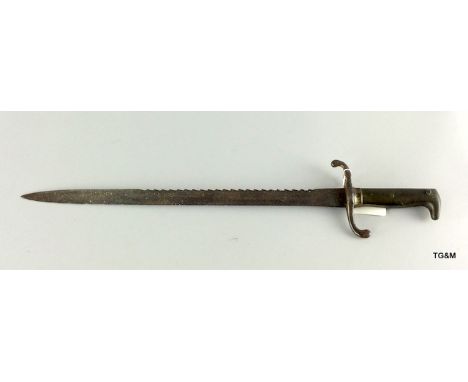 A Prussian model 1871 NCOs saw backed bayonet. 60cms overall length with pitting to the blade