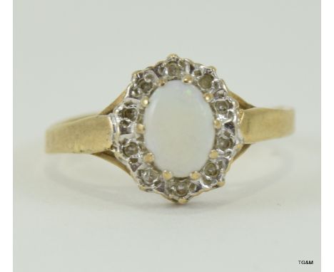 9ct gold ladies opal and diamond ring size N 