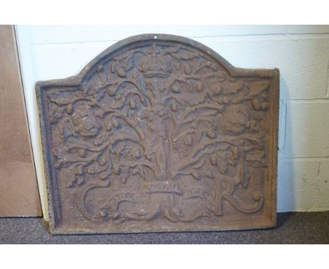 A 18th century style cast iron fire back depicting the Great Oak and the royal cipher  'G R' , 71cm x 84cm