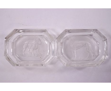 A pair of Baccarat rectangular pin tray, one with a bull dog intaglio and the other with a greyhound, butterfly signature to 