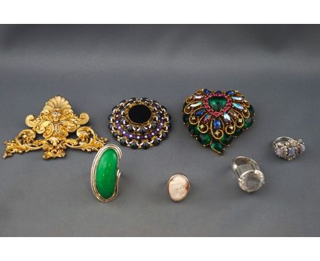 A collection of costume and other jewellery, including; an oval cabochon sapphire three stone and paste cluster ring; an oval