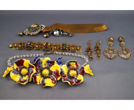 A small quantity of costume and other jewellery to include a gilt gemset panel bracelet with earrings, a cultured freshwater 