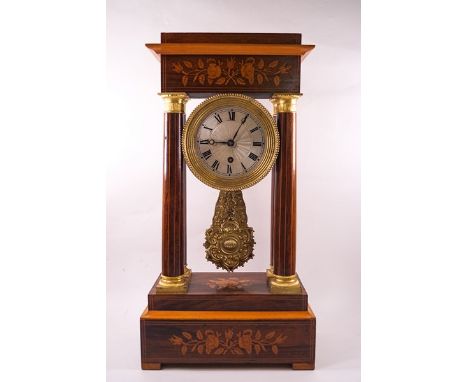 A 19th century rosewood Portico clock in the Empire style with box wood line and floral inlays, ornate brass pendulum, 51cm h