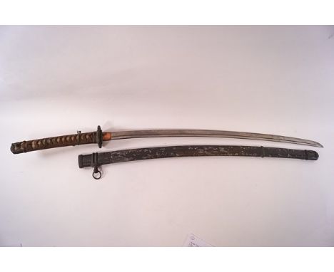 An early 20th century Japanese Katana and scabbard with cotton bound shagreen grip 