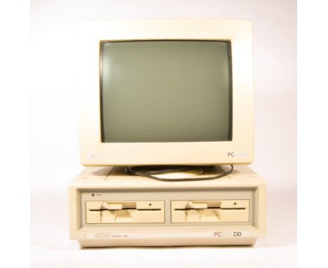 Amstrad PC1512DD early computer, with screen, keyboard and manual. 