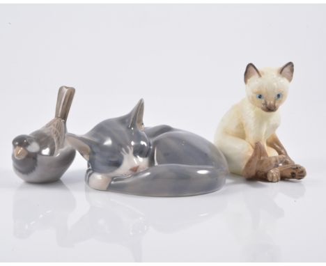 Royal Copenhagen, model of sleeping cat, No.422, width 15cm; Copenhagen model of sparrow; four Copenhagen plates, and a Royal