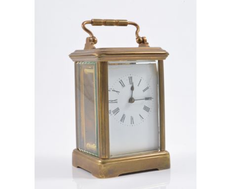 French brass cased carriage clock, white enamel dial, platform escapement, 13cm.