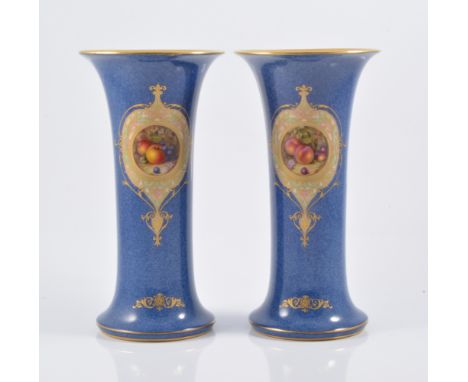 A pair of Royal Worcester trumpet shaped vases, speckled blue ground with handpainted reserves by William Bee depicting fruit