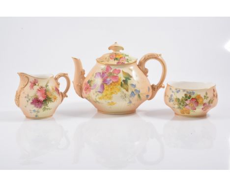 Royal Worcester blush ivory teaware pattern number 544 decorated with flowers comprising four cups, four saucers, teapot, mil