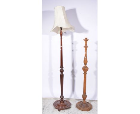 Mahogany standard lamp, turned column, octagonal base, with shade, height 190cm; and another standard lamp column.