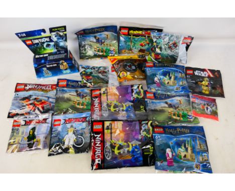 Lego - A group of approximately 17 mostly polybagged and factory sealed Lego predominately 'film' themed sets. Lot includes L