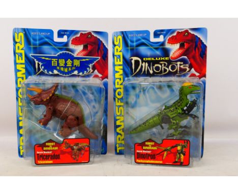 Hasbro - Transformers - 2 x unopened carded 1999 dated Transformers Dinobots models, Dinotron Pachycephalosaurus and Tricerad