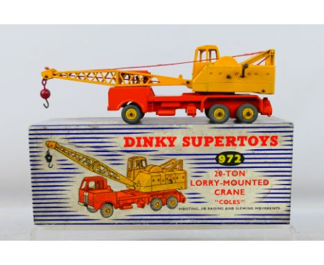 Dinky - A boxed Coles 20-Ton Lorry Mounted Crane in orange and yellow livery # 972. Consigned to us from its original owner a