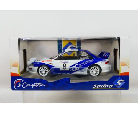 Solido - A boxed Subaru Impreza S5 WRC 1999 Rally Azimut Di Monza car in 1:18 scale # S1807403. The car appears mint in a Goo