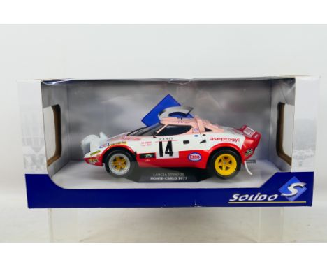 Solido - A boxed Lancia Stratos 1977 Monte-Carlo Rally car in 1:18 scale # S1800805. The car appears mint in a Good box with 