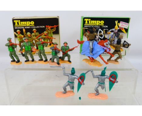 Timpo - Two boxed sets of Timpo plastic figures. Lot consists of #708 Timpo Historic Collection - One mounted and 3 standing 