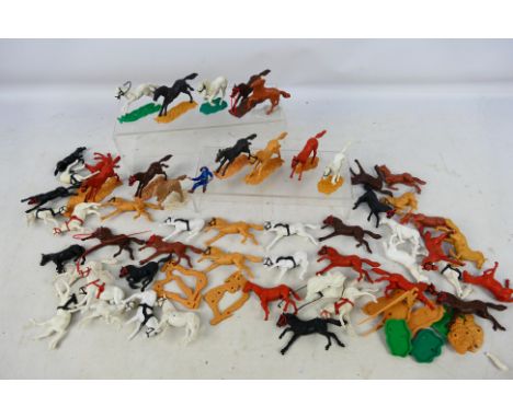 Timpo - A large unboxed herd of Timpo Swoppet style horses. The horses appear to be from various Timpo series and are in a va