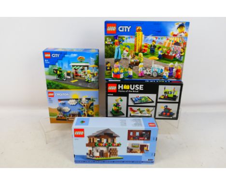 Lego - A mixed collection of five boxed factory sealed Lego sets from various ranges. Sets include Lego #40594 Houses of the 