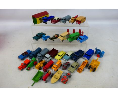 Matchbox - An assortment of over 30 vintage Lesney Matchbox vehicles in a playworn condition to include  #29 Bedford, #43 Hil