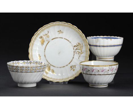 THREE CAUGHLEY TEA BOWLS AND A SAUCER, C1792-95 various patterns and sizes, saucer with gilder's letter H ++Two of the tea bo