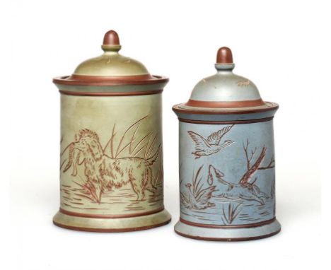 TWO SALOPIAN ART POTTERY SGRAFFITO TOBACCO JARS AND COVERS, DECORATED BY JAMES ARTHUR HARTSHORNE IN MANNER OF HANNAH B BARLOW
