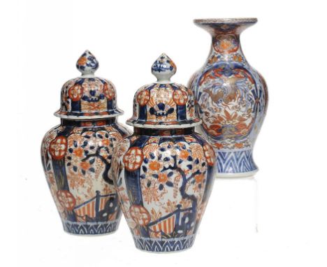 A PAIR OF JAPANESE IMARI VASES AND COVERS AND A CONTEMPORARY IMARI VASE, MEIJI 30 and 26.5cm h ++One of the pair of vases wit