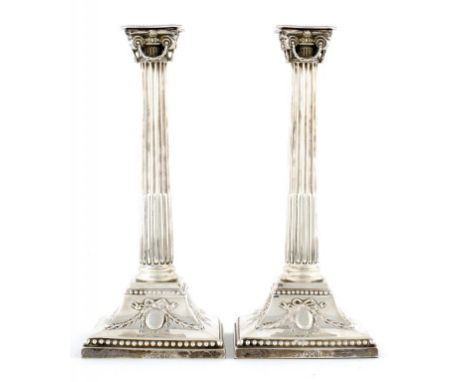 A PAIR OF VICTORIAN SILVER NEO CLASSICAL STYLE COLUMNAR CANDLESTICKS 31.5cm h, by Favell, Elliott & Co, London 1887, loaded +